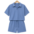Hanger front – WEELZ petrol-blue textured V-collar shorts set