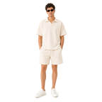 Model front – WEELZ off-white textured V-collar shorts set
