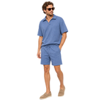 Model angled – WEELZ petrol-blue textured V-collar shorts set