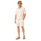 Model angled – WEELZ off-white textured V-collar shorts set