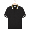 WEELZ geometric-trim zip knit polo in black — front on hanger