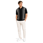 WEELZ Vertical Stripe Zip Knit Polo in Black & White — styled with cream trousers