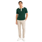 WEELZ Contrast-Collar Button Knit Polo in Forest Green — styled with stone trousers