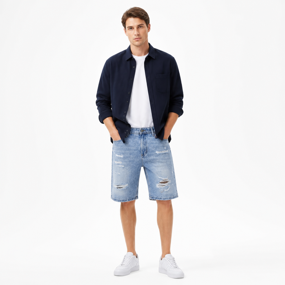 WEELZ light blue distressed denim shorts styled on model 2