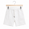 WEELZ Kids Sweat Shorts — White, front view on hanger