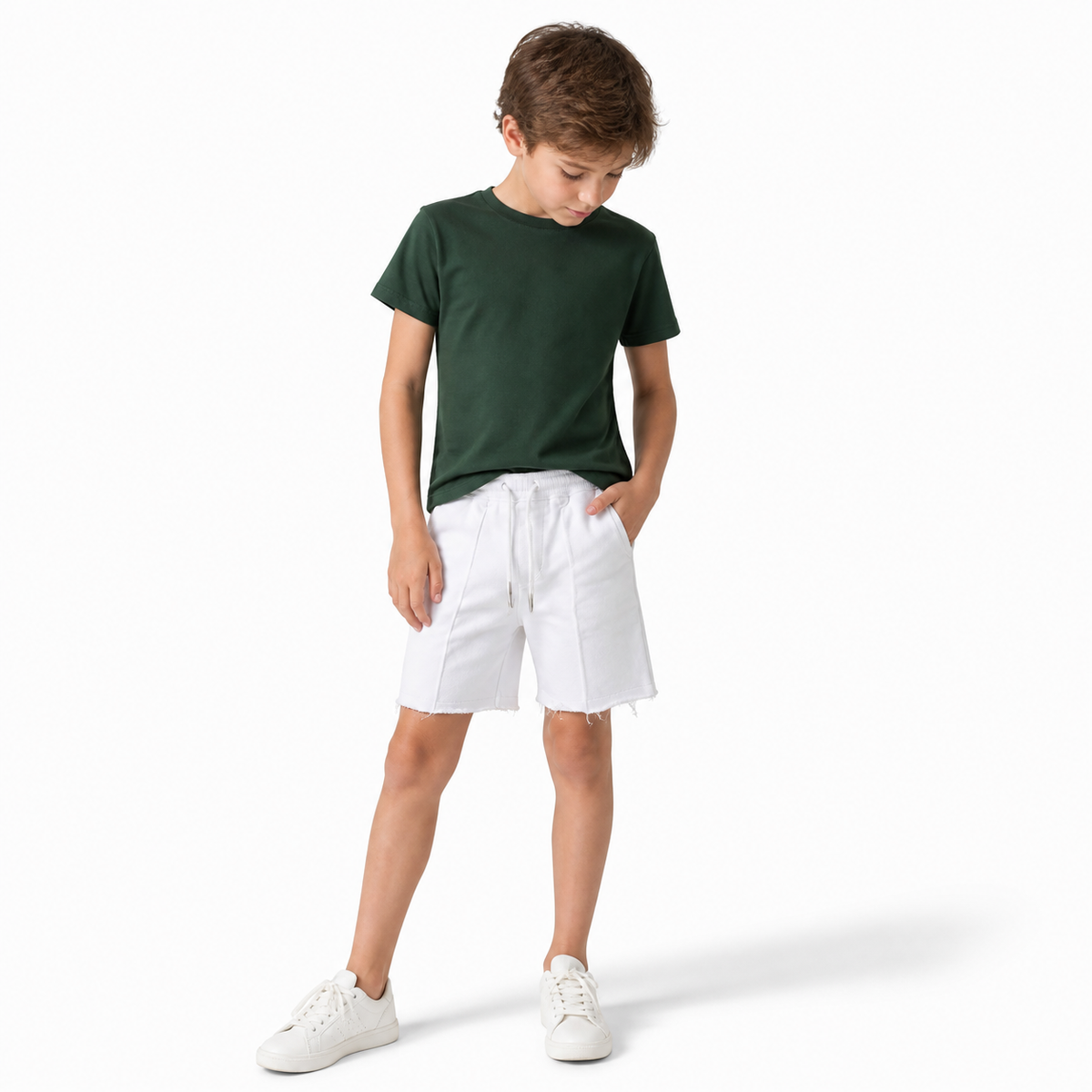 WEELZ Kids Sweat Shorts — White, styled on child model with green tee