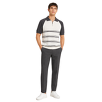 WEELZ grey and off-white raglan stripe zip knit polo worn with charcoal tailored trousers