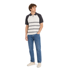 WEELZ grey and off-white raglan stripe zip knit polo worn with medium blue denim jeans