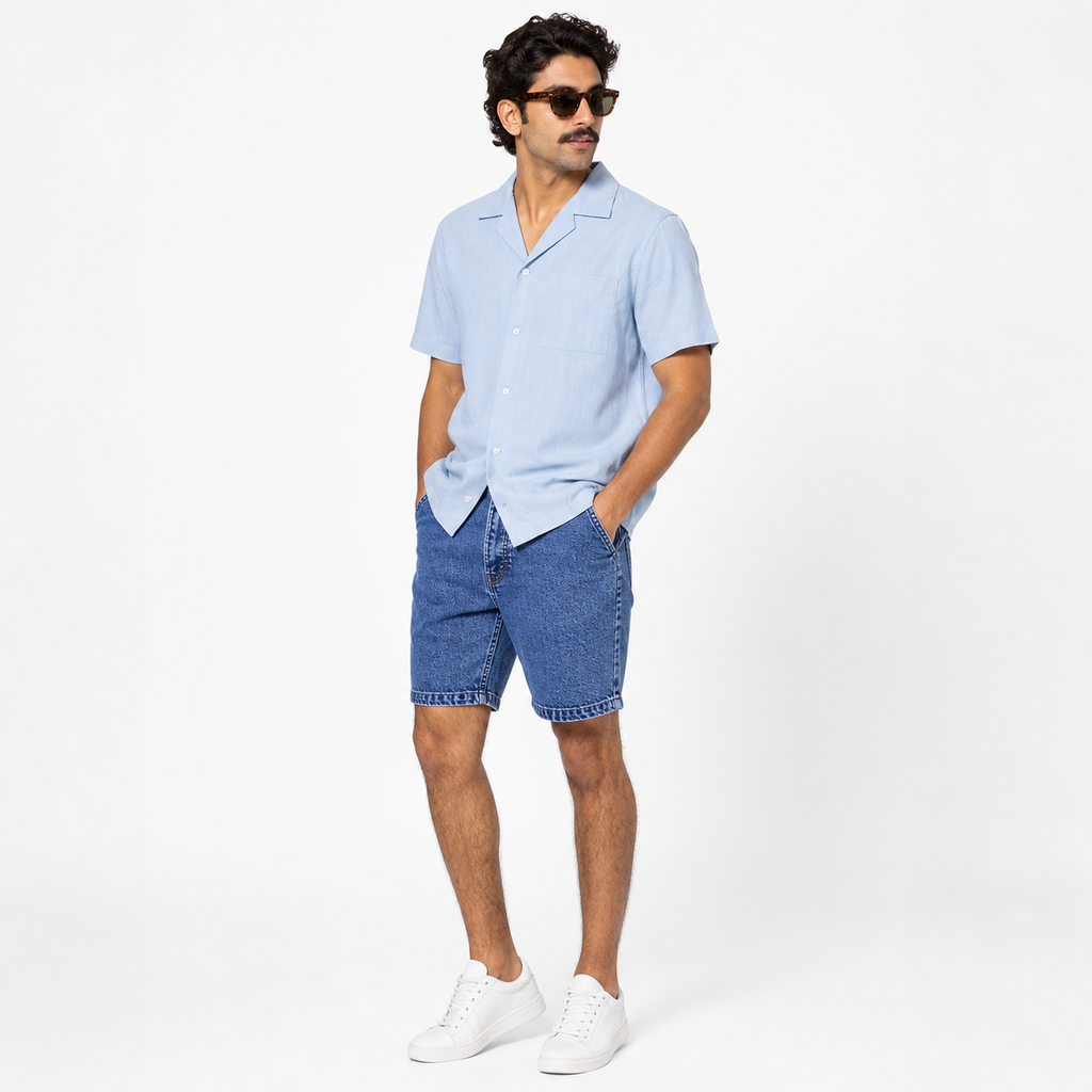 WEELZ Relaxed-Fit Distressed Denim Shorts — Indigo Blue styled model view