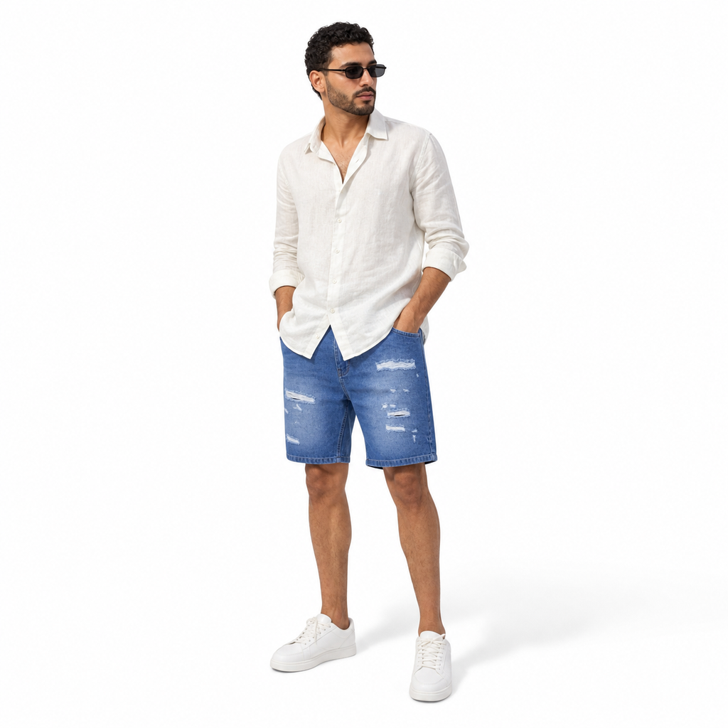 WEELZ Relaxed-Fit Distressed Denim Shorts — Mid Blue Distressed styled model view