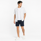 WEELZ striped linen-blend short-sleeve shirt in sky blue and cream, styled on model 3