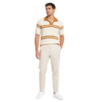 WEELZ cream and tan striped V-neck knit polo worn with stone tailored trousers