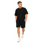 WEELZ black textured cotton T-shirt and shorts set worn by model — look 2