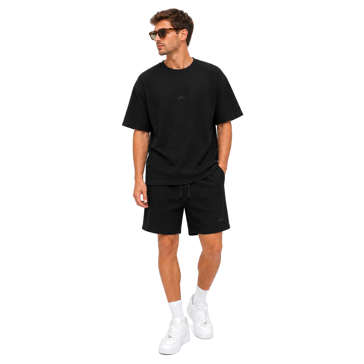 WEELZ black textured cotton T-shirt and shorts set worn by model — look 3