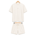 WEELZ off-white textured cotton T-shirt and shorts set on hanger — front