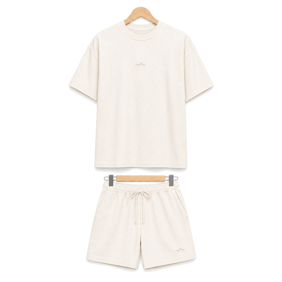 WEELZ off-white textured cotton T-shirt and shorts set on hanger — front