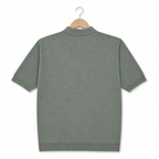 WEELZ olive textured zip knit polo on hanger back